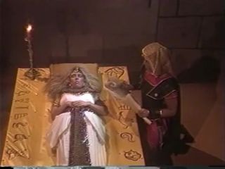 Scissoring A blonde slut dressed up like an egyptian queen sucks a dick and fucks MagPost