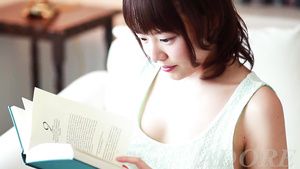 Glamour Porn Excited cutie shows off her hairy pussy while reading a book BadJoJo