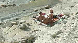 Cuckold A nudist couple have fun at the beach. Full amateur...