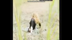 Hot Fucking Crazy Bizarre Fetish Fully Clothed MILF In Big Puddle Of Liqued Dirt Transvestite