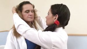 GirlScanner Lesbo teacher and young student tongue kissing in classroom Teenporno