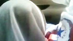 Buttplug Malay girl Hijab Scarf Sucking Cock inside a car Beach