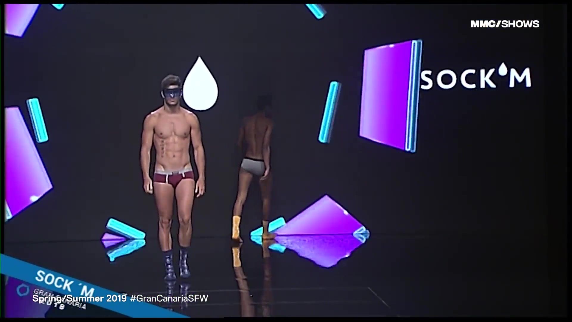 Tall MODA BANO. Handsome guys showing new models of men's swimwear Mmf